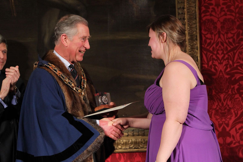 Photo of Queen Silver Medal winner meeting His Majesty the King