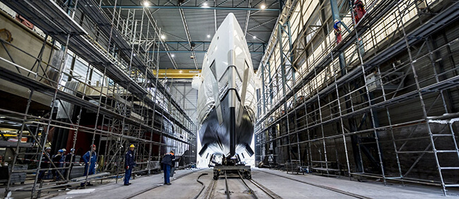 ship yard dry dock with new build underway